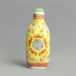Chinese porcelain imperial yellow ground snuff bottle with a carved jade stopper. 8 cm. UK