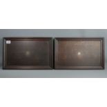 A pair of 1920's dark wood trays with silver shield shape plaques to the centre. 48 x 30 cm. UK