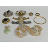 A box of jewellery including two 9ct gold paste set rings (7 grams), a gold watch, banded agate