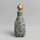 A Chinese pottery snuff bottle with gilt metal mounts. 9.8 cm. UK Postage £12.