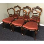 A set of six Victorian walnut cloud back dining chairs, circa 1880. Collection only.