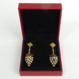 A pair of gold and seed pearl grape design earrings with 9ct butterflies, 7.7 grams. 43 x 14 mm.