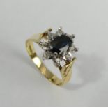 18ct gold sapphire and diamond ring, Sheffield 1978, 5 grams. Size R, 13 mm. UK Postage £12.