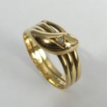 18ct gold diamond set snake ring, 4.3 grams, Chester 1915. Size Q 1/2, 9.9 mm. UK Postage £12.