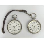 Two Victorian silver pocket watches, largest 70 x 51 mm. UK Postage £12.