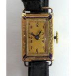 14ct gold and enamel cocktail watch with a manual wind jewelled movement. 15 mm wide inc. button. UK