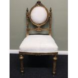 An ornate gilt wood salon chair. 41 x 82 cm. Collection only.