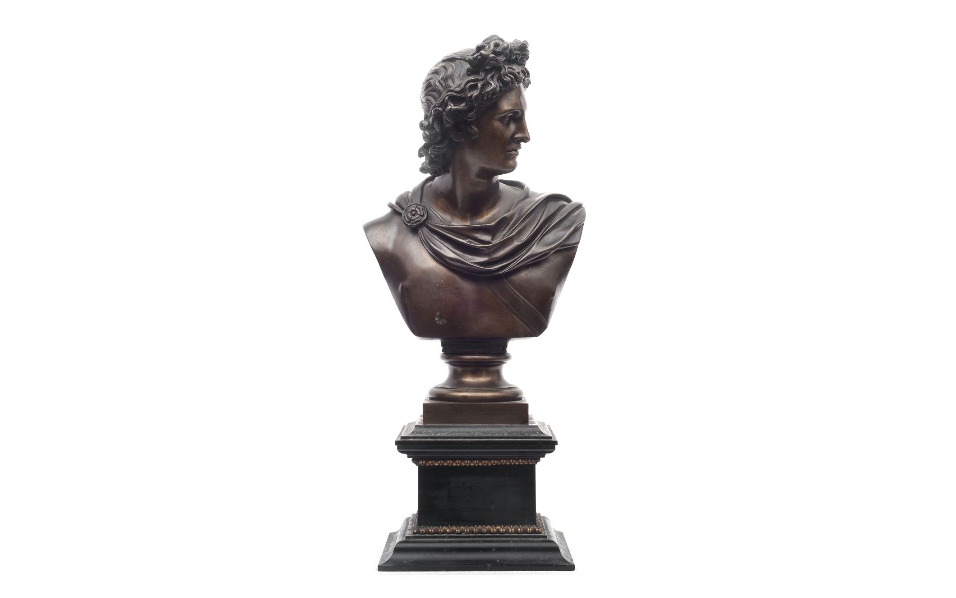 A MID 19TH CENTURY GRAND TOUR BRONZE BUST OF THE APOLLO BELVEDERE