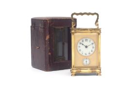 A LATE 19TH CENTURY FRENCH GILT BRASS CARRIAGE CLOCK WITH ALARM AND CASE