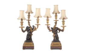 A PAIR OF EARLY 19TH CENTURY CANDELABRA AFTER THE MODEL BY CAFFIERI AND ALGARDI