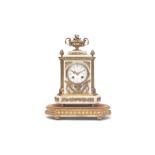 A LATE 19TH CENTURY FRENCH WHITE MARBLE AND GILT METAL MANTEL CLOCK