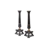 A FINE AND LARGE PAIR OF REGENCY BRONZE CANDLESTICKS