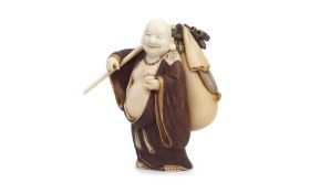 A JAPANESE MEIJI PERIOD IVORY OKIMONO OF HOTEI