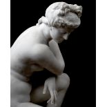 A LIFE-SIZE EARLY 20TH CENTURY ITALIAN MARBLE FIGURE OF THE CROUCHING VENUS