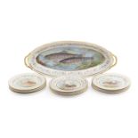 AN EARLY 20TH CENTURY LIMOGES PORCELAIN FISH SERVICE BY PAUL PASTAUD