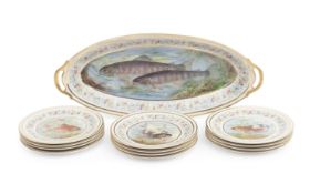 AN EARLY 20TH CENTURY LIMOGES PORCELAIN FISH SERVICE BY PAUL PASTAUD