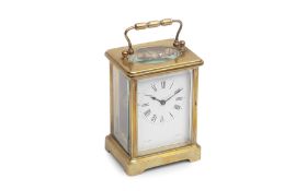 AN EARLY 20TH CENTURY FRENCH LAQUERED BRASS CARRIAGE CLOCK