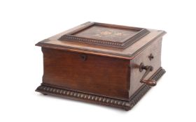 AN EARLY 20TH CENTURY OAK CASED 13 INCH SYMPHONION DISC MUSIC BOX