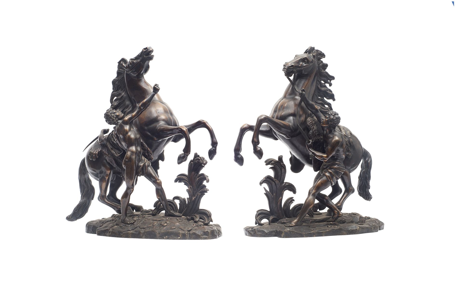 AFTER GUILLAUME COUSTOU (FRENCH, 1677-1746): A PAIR OF LATE 19TH CENTURY BRONZE MARLEY HORSES