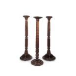 A PAIR OF 19TH CENTURY MAHOGANY PEDESTALS TOGETHER WITH ANOTHER