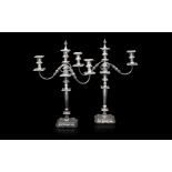A PAIR OF GEORGIAN STYLE SILVER PLATED CANDELABRA
