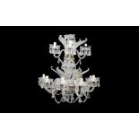 AN 18TH CENTURY STYLE CUT, MOULDED AND ETCHED GLASS TWO TIER CHANDELIER