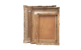 THREE LATE 19TH / EARLY 20TH CENTURY GILT AND GESSO MOUNTED FRAMES