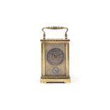 A 19TH CENTURY FRENCH GILT BRASS CARRIAGE CLOCK WITH ALARM