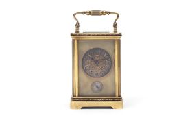 A 19TH CENTURY FRENCH GILT BRASS CARRIAGE CLOCK WITH ALARM