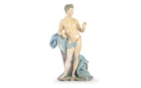 A 19TH CENTURY MEISSEN STYLE GLAZED FIGURE OF APOLLO