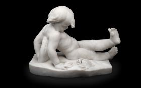 A 19TH CENTURY ITALIAN MARBLE FIGURE OF A BOY BESIDE A CRAB