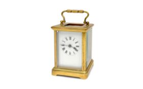 A LATE 19TH CENTURY FRENCH GILT BRASS CARRIAGE CLOCK