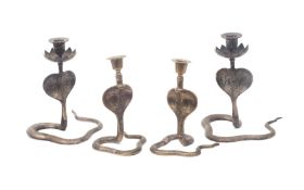 TWO PAIRS OF 19TH / EARLY 20TH CENTURY INDIAN COBRA CANDLESTICKS