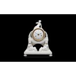 AN EARLY 19TH CENTURY FRENCH WHITE MARBLE FIGURAL MANTEL CLOCK