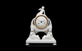 AN EARLY 19TH CENTURY FRENCH WHITE MARBLE FIGURAL MANTEL CLOCK