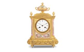 A FINE THIRD QUARTER 19TH CENTURY GILT BRONZE AND PINK PORCELAIN CLOCK