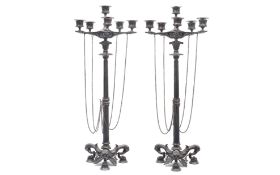 A PAIR OF 19TH CENTURY SILVERED BRONZE CANDELABRA IN THE MANNER OF BARBEDIENNE