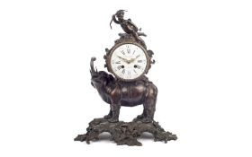 A LATE 19TH CENTURY FRENCH PATINATED BRONZE ELEPHANT MANTEL CLOCK