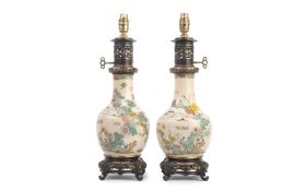 A PAIR OF EARLY 20TH CENTURY CHINESE REPUBLIC PERIOD PORCELAIN AND BRONZE MOUNTED LAMP BASES