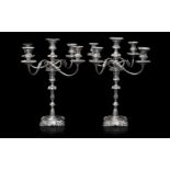 A PAIR OF EARLY 20TH CENTURY SILVER PLATED CANDELABRA