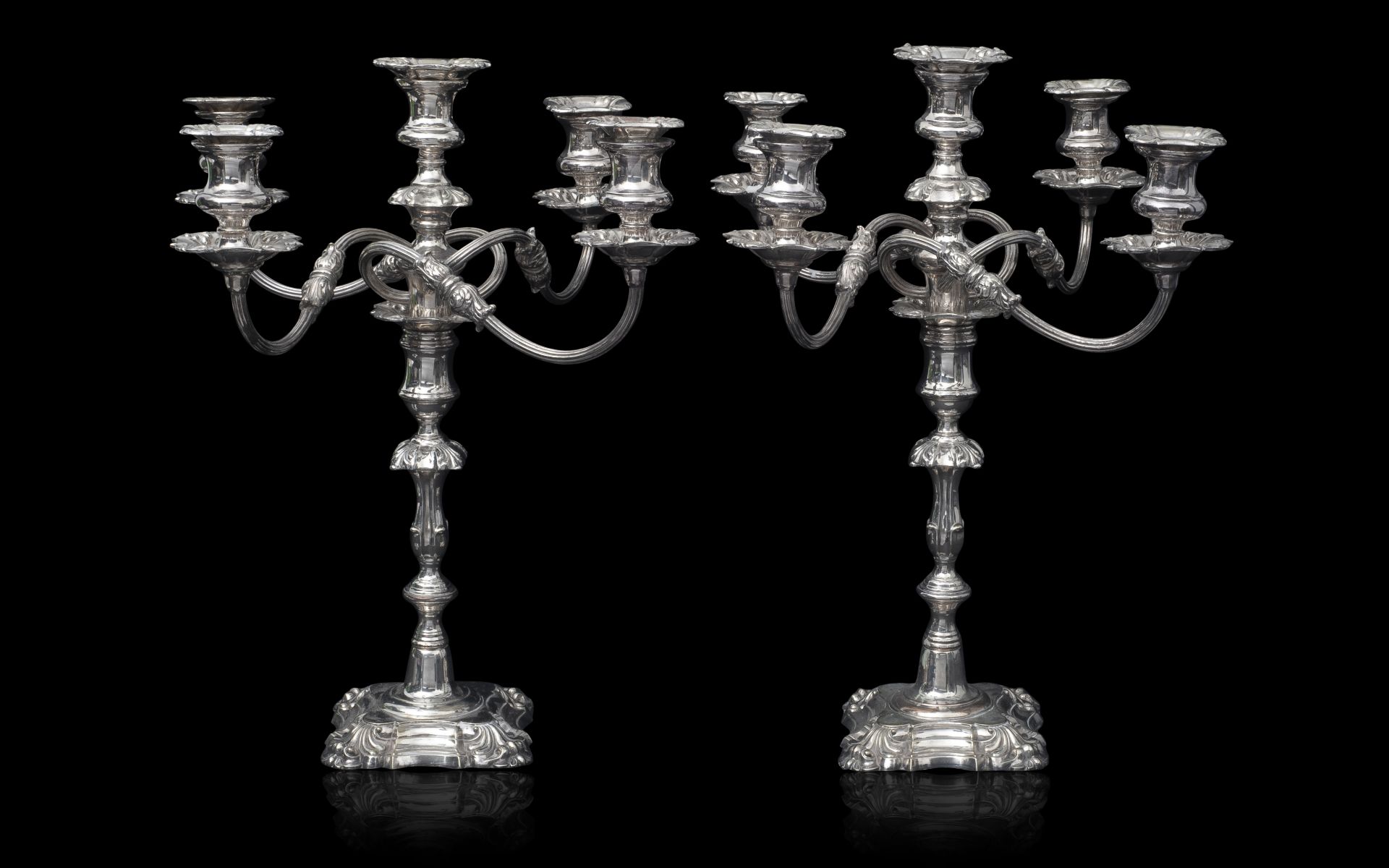 A PAIR OF EARLY 20TH CENTURY SILVER PLATED CANDELABRA