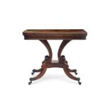 A REGENCY ROSEWOOD AND BRASS INLAID CARD TABLE