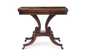 A REGENCY ROSEWOOD AND BRASS INLAID CARD TABLE