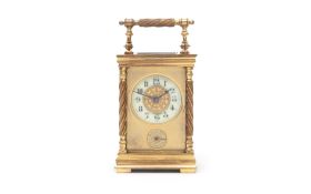 A LATE 19TH CENTURY FRENCH GILT BRASS CARRIAGE CLOCK WITH ALARM