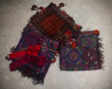 THREE AFGHAN SADDLE BAGS