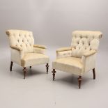 A PAIR OF 19TH CENTURY BUTTON BACK ARMCHAIRS