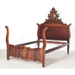 A 19TH CENTURY SPANISH MAHOGANY AND MARQUETRY BED