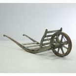 A LARGE 19TH CENTURY WOODEN WHEEL BARROW OR CART