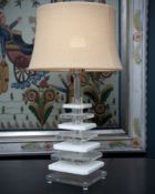 A GEOMETRIC PERSPEX LAMP WITH HESSIAN SHADE