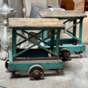 A PAIR OF EARLY 20TH CENTURY PAINTED METAL AND WOOD CARRIAGE TROLLEYS